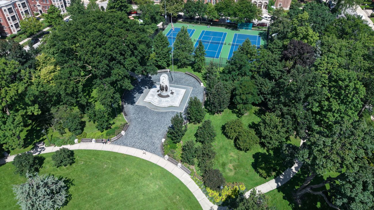 aerial image of scoville park tennis courts, trees, and grassy field